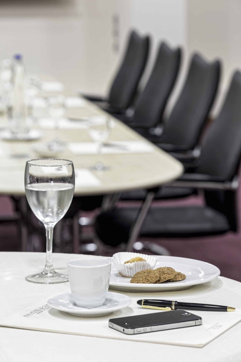 Ava meeting room with coffee and cookies.